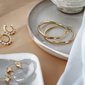 aesthetic golden earrings arrangement aesthetic golden earrings arrangement